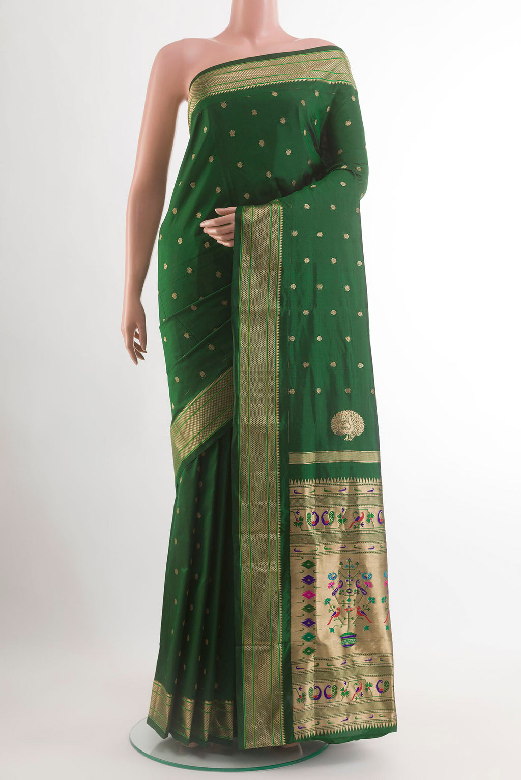 Bottle Green Paithani Silk Saree with Zari Butta on the body and Zari Border.  displayed on a mannequin