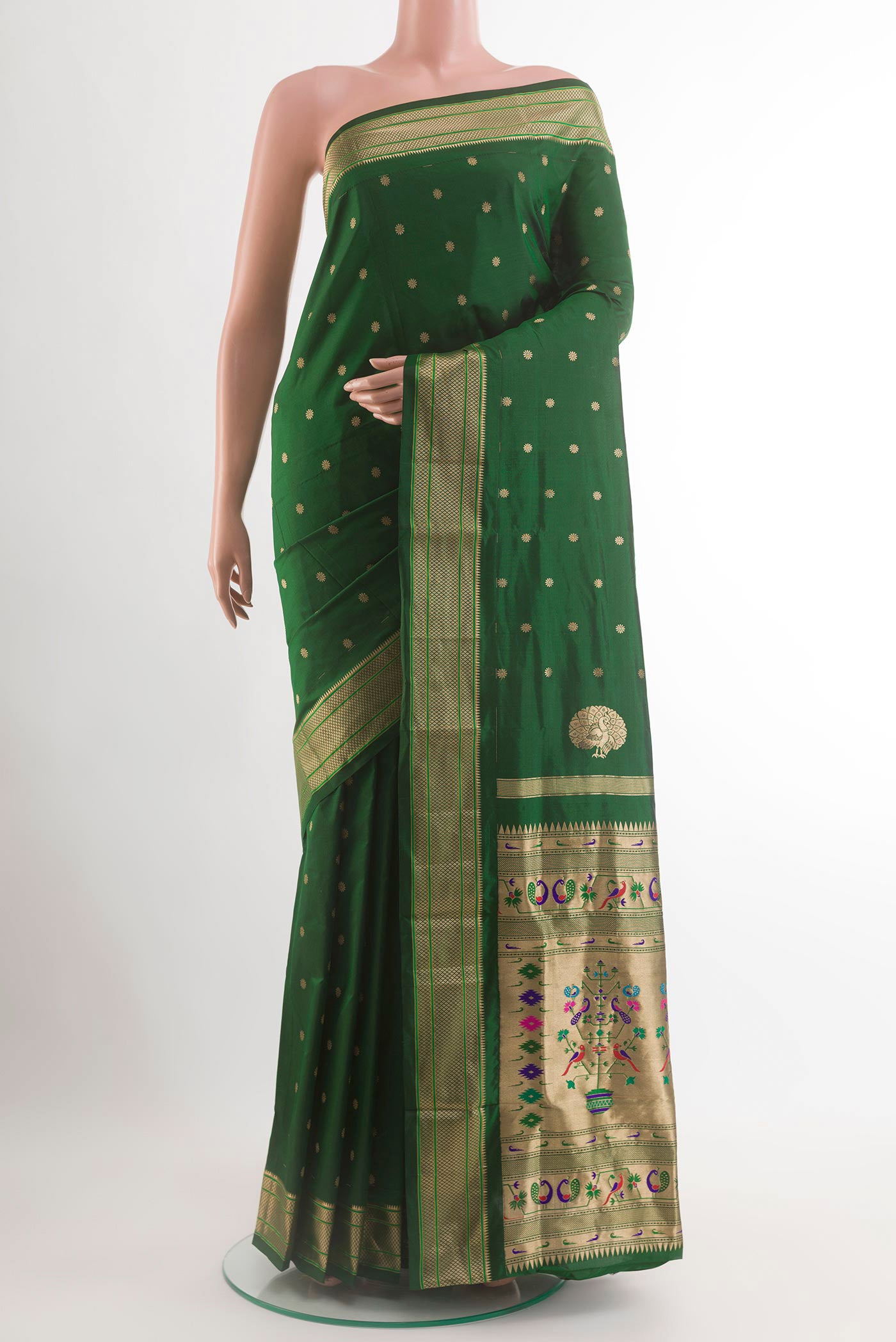 Bottle Green Paithani Silk Saree with Zari Butta on the body and Zari Border.  displayed on a mannequin