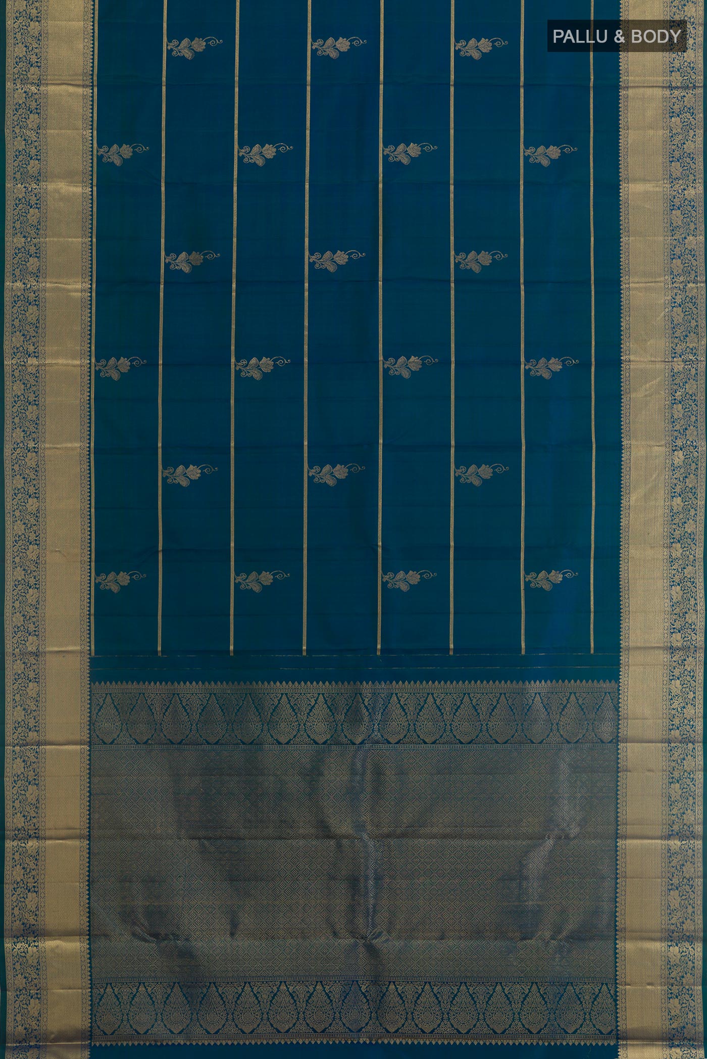 Flat view of Peacock Blue Kanjivaram Silk Saree with Zari Butta on the body and Zari Border. 