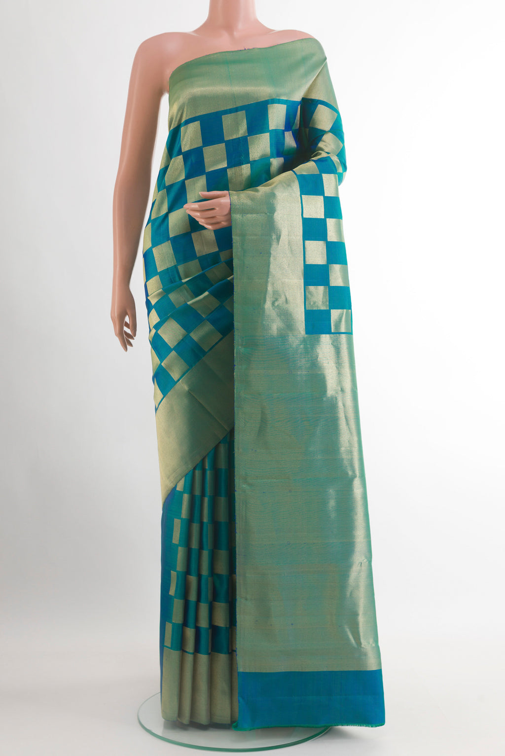Peacock Blue Dual Tone Kanchipuram Silk Saree with Zari Brocade on the body and Zari Border.  displayed on a mannequin