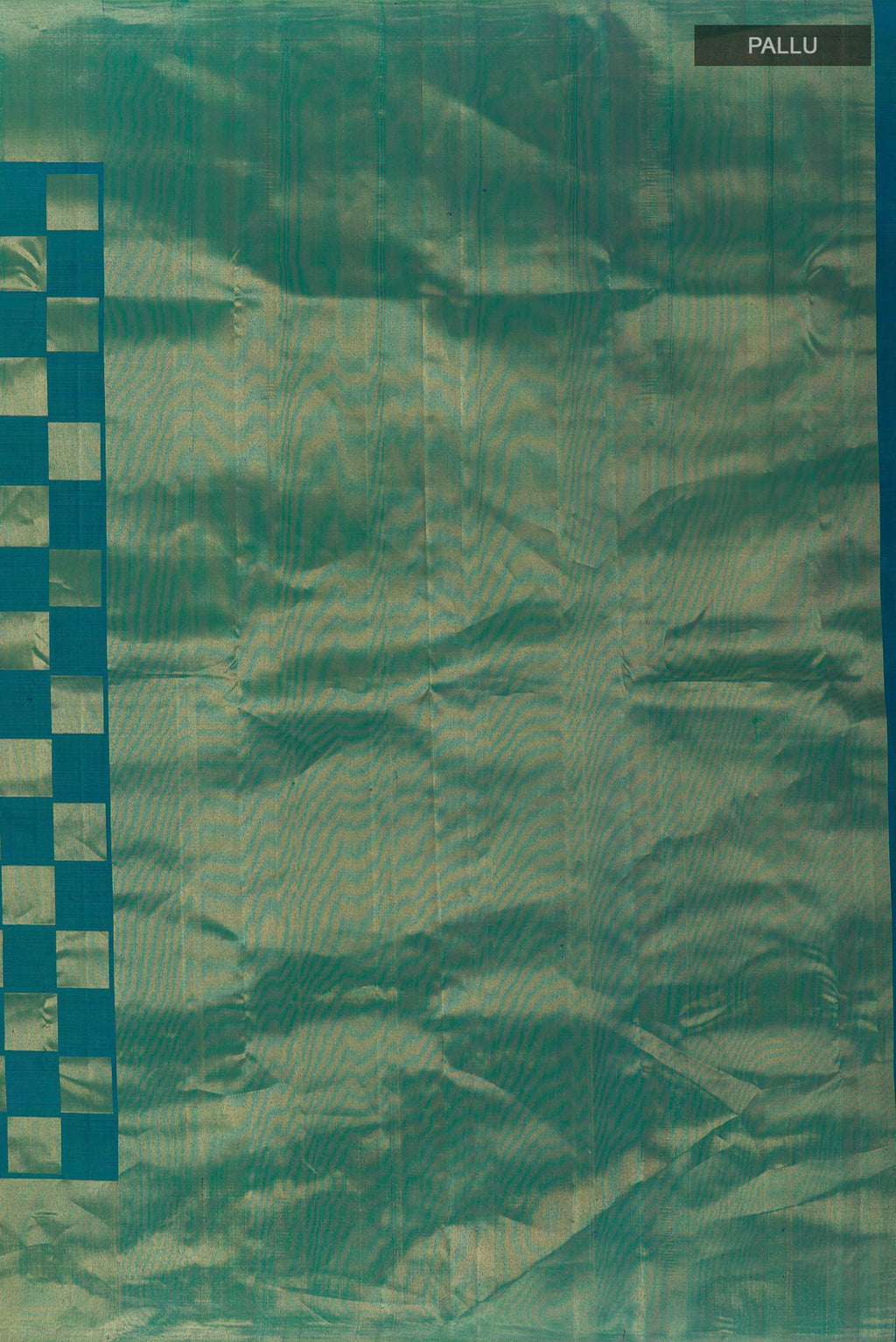 Close up image of the pallu of Peacock Blue Dual Tone Kanchipuram Silk Saree with Zari Brocade on the body and Zari Border. 