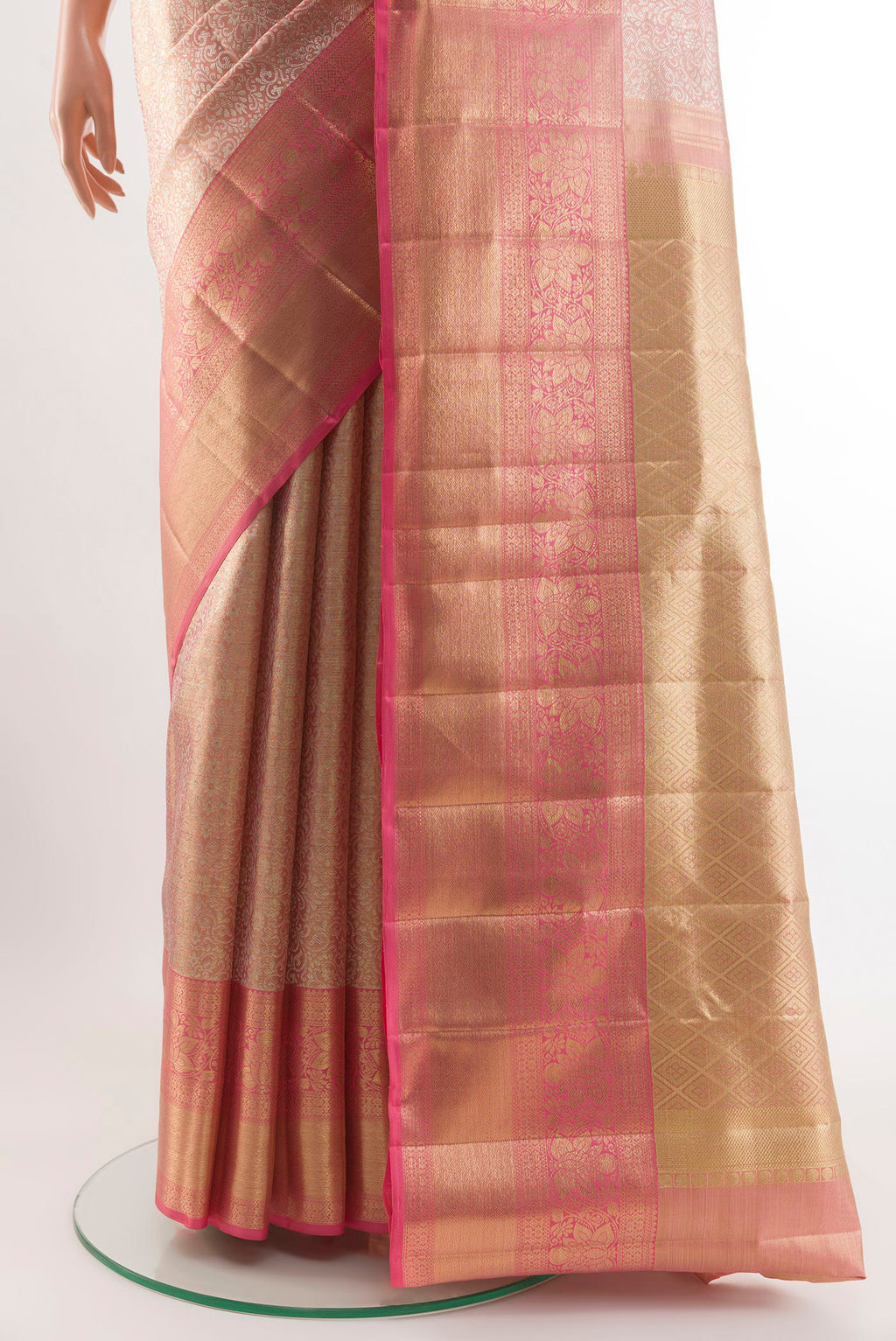 Pleats and pallu of Rose Gold Kanjivaram Tissue Silk Saree with Zari Brocade on the body and Zari Border. 