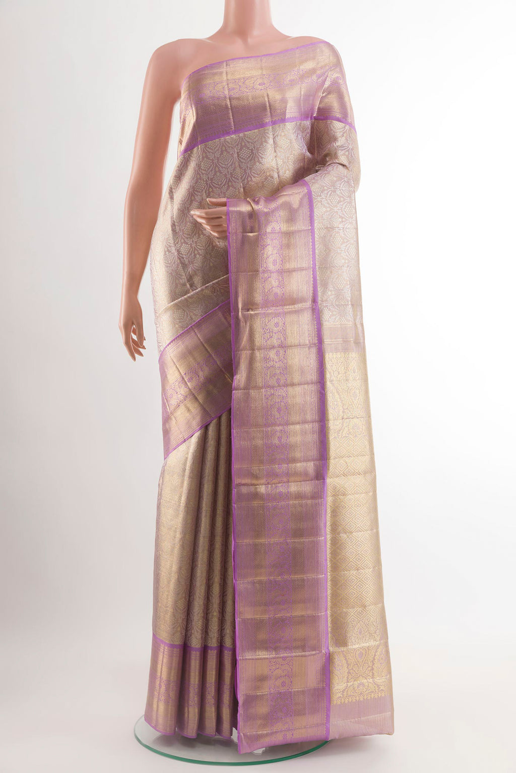 Lavender Kanjivaram Tissue Silk Saree with Zari Brocade on the body and Zari Border.  displayed on a mannequin