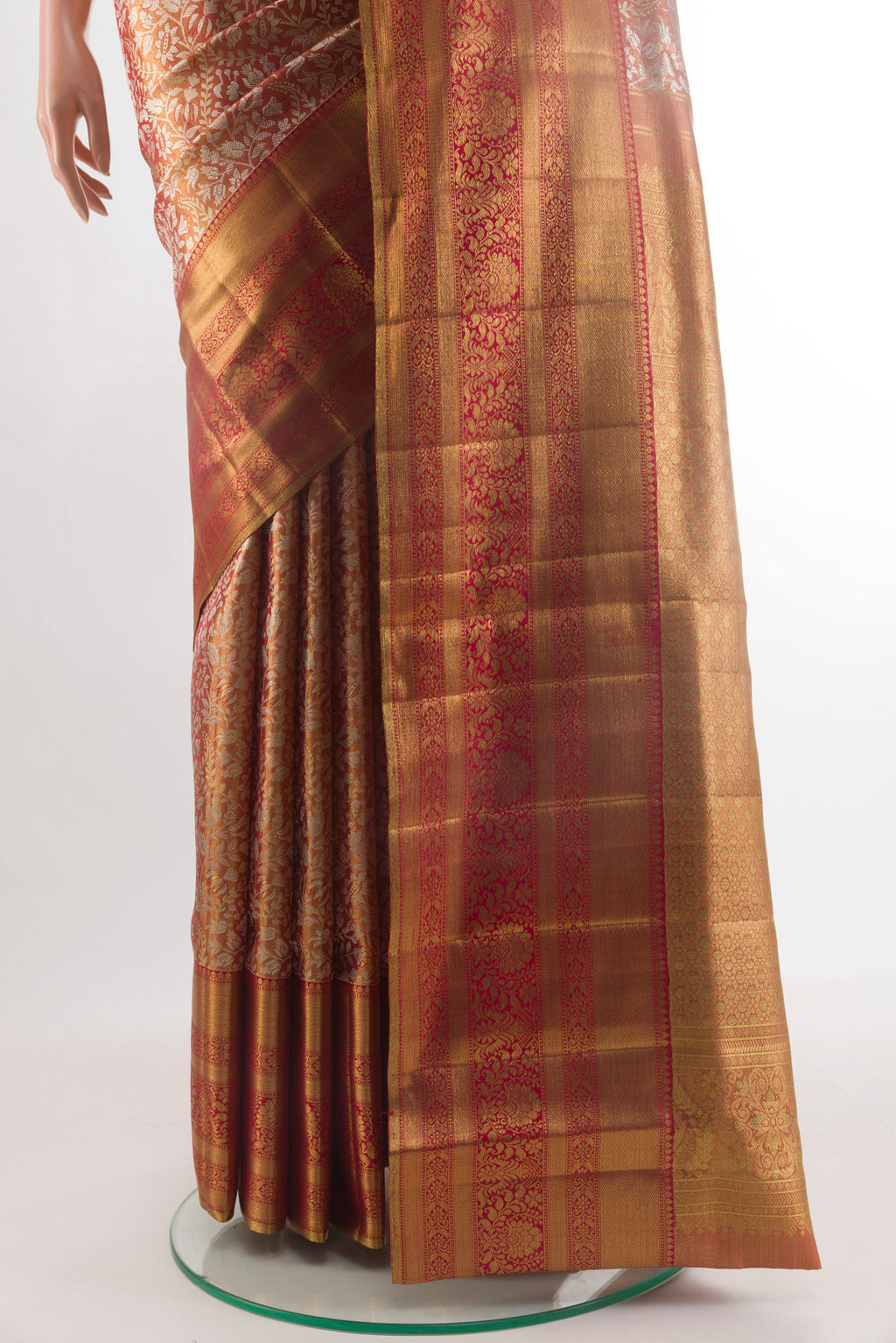 Pleats and pallu of Golden Kanjivaram Tissue Silk Saree with Zari Brocade on the body and Zari Border. 