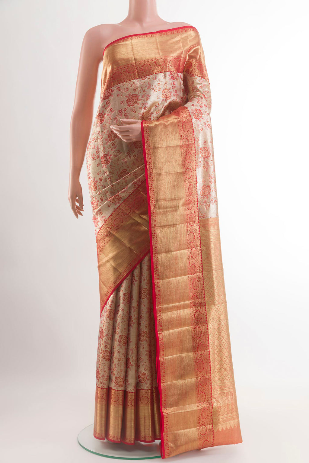 Gold Kanjivaram Tissue Silk Saree with Zari Brocade on the body and Zari Border.  displayed on a mannequin
