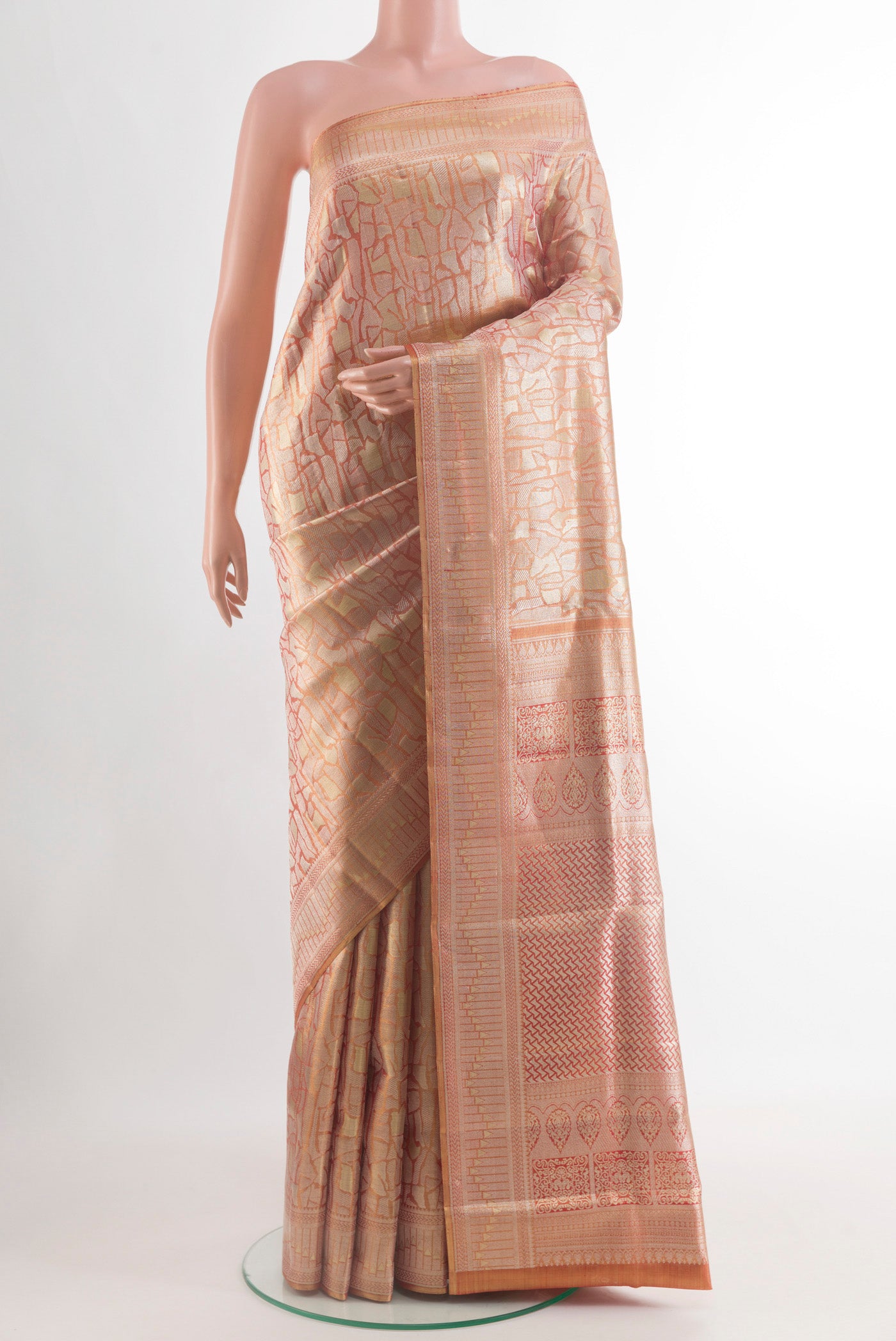 Golden Peach Dual Tone Kanjivaram Tissue Silk Saree with Zari Brocade on the body and Zari Border.  displayed on a mannequin