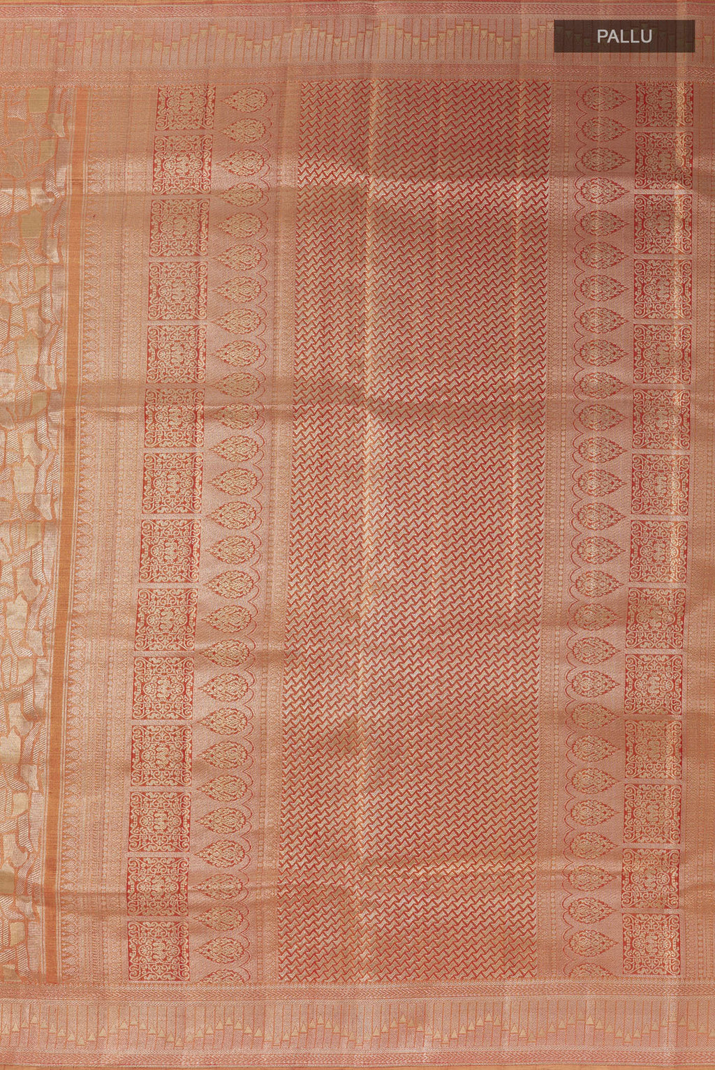 Close up image of the pallu of Golden Peach Dual Tone Kanjivaram Tissue Silk Saree with Zari Brocade on the body and Zari Border. 