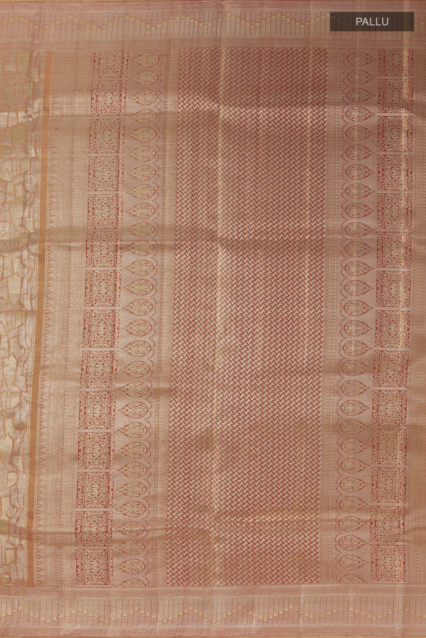 Close up image of the pallu of Golden Peach Dual Tone Kanjivaram Tissue Silk Saree with Zari Brocade on the body and Zari Border. 