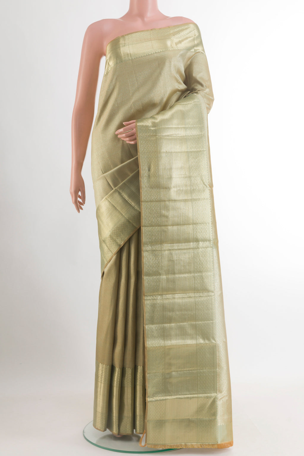 Olive Green Kanchipuram Tissue Silk Saree with Zari Brocade on the body and Zari Border.  displayed on a mannequin