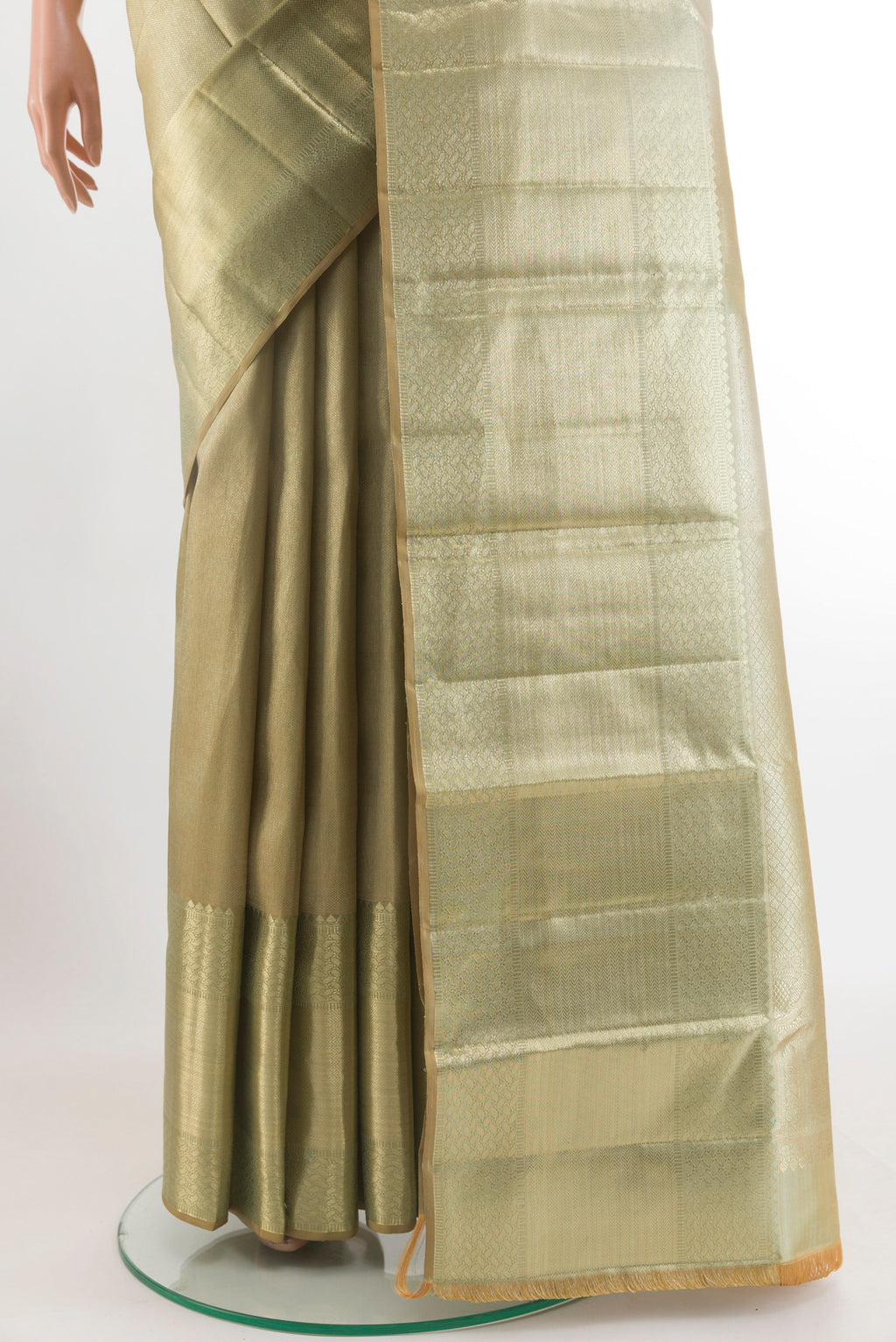 Pleats and pallu of Olive Green Kanchipuram Tissue Silk Saree with Zari Brocade on the body and Zari Border. 
