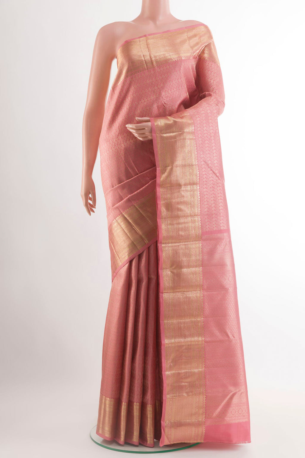 Rose pink Kanchipuram Silk Saree with Zari Brocade on the body and Zari Border.  displayed on a mannequin
