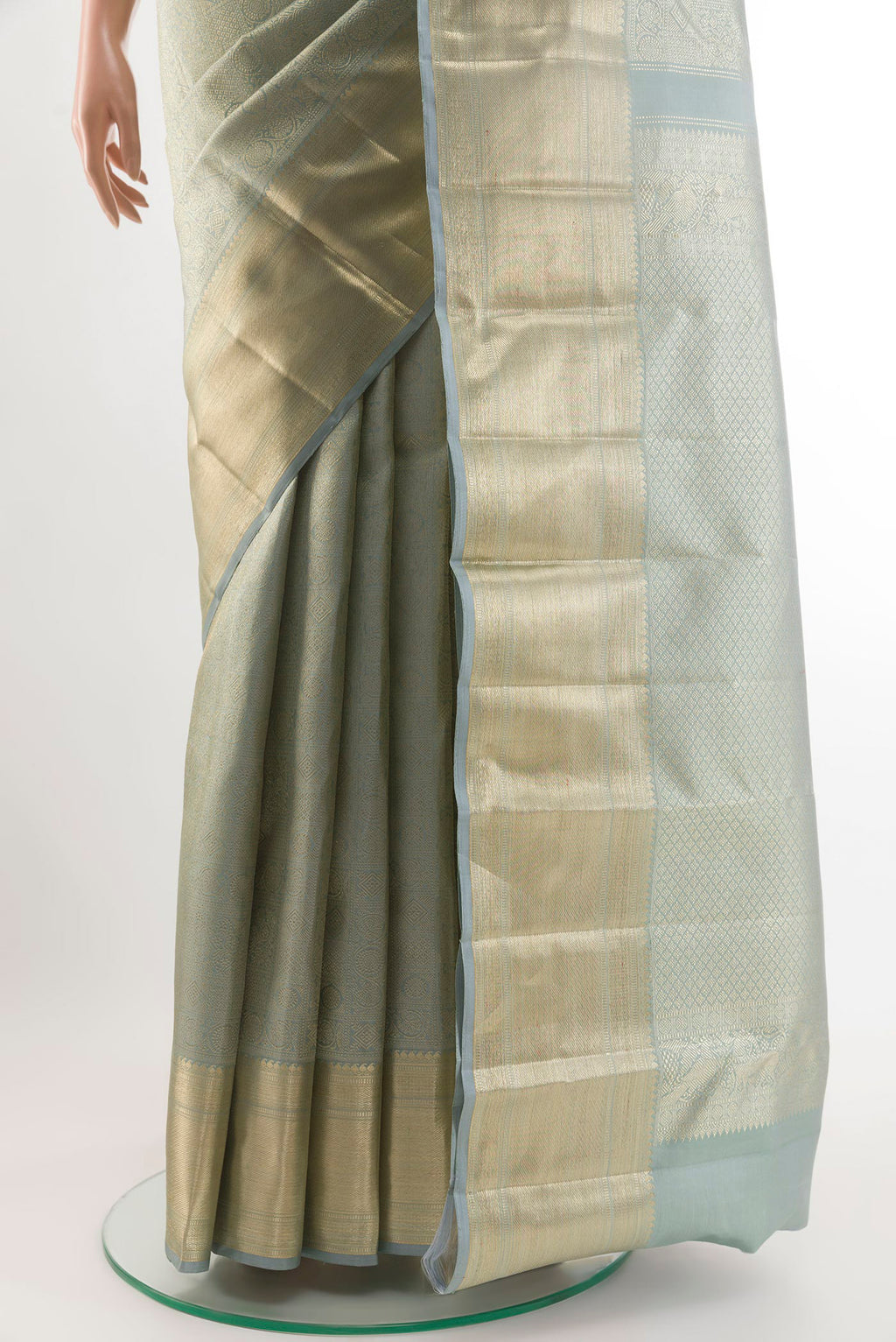 Pleats and pallu of Blue Grey Kanchipuram Silk Saree with Zari Brocade on the body and Zari Border. 