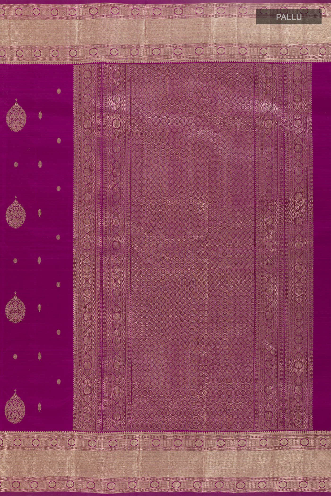Close up image of the pallu of Magenta Kanjivaram Silk Saree with Zari Butta on the body and Zari Border. 