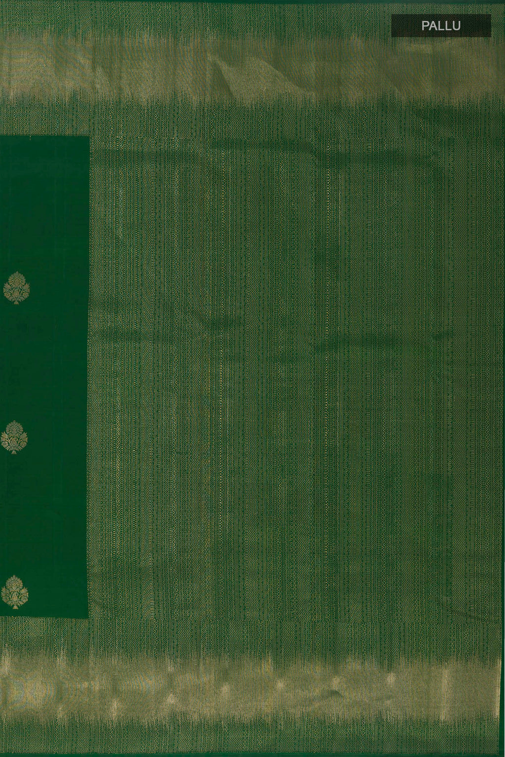 Close up image of the pallu of Green Kanjivaram Silk Saree with Zari Butta on the body and Zari Border. 