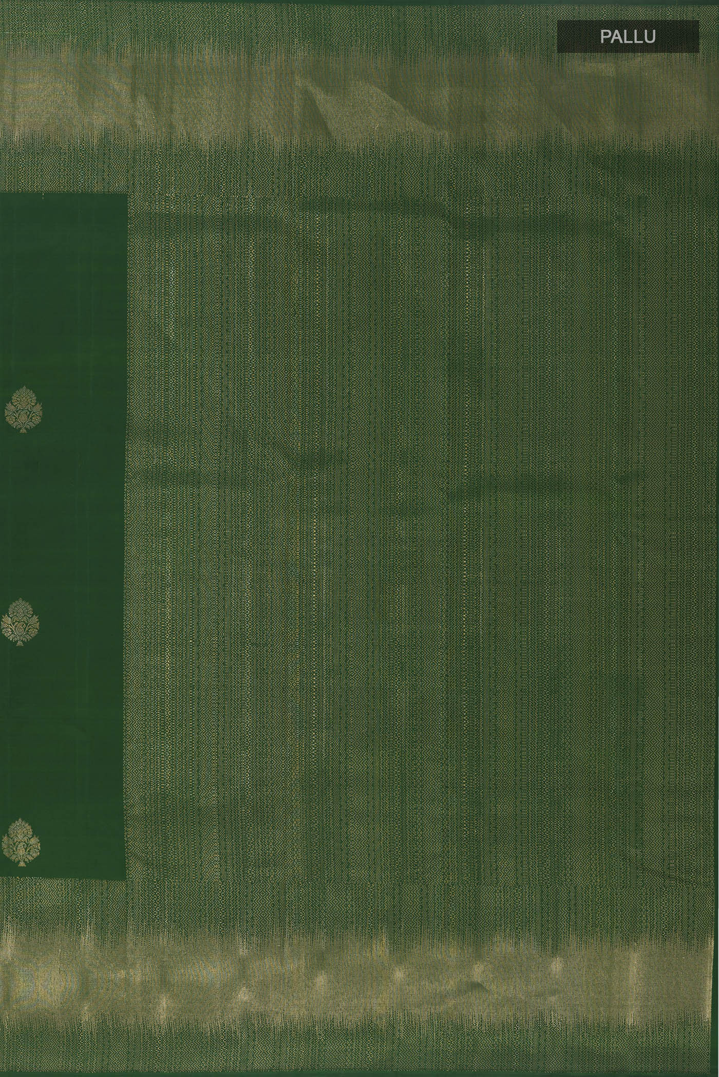 Close up image of the pallu of Green Kanjivaram Silk Saree with Zari Butta on the body and Zari Border. 