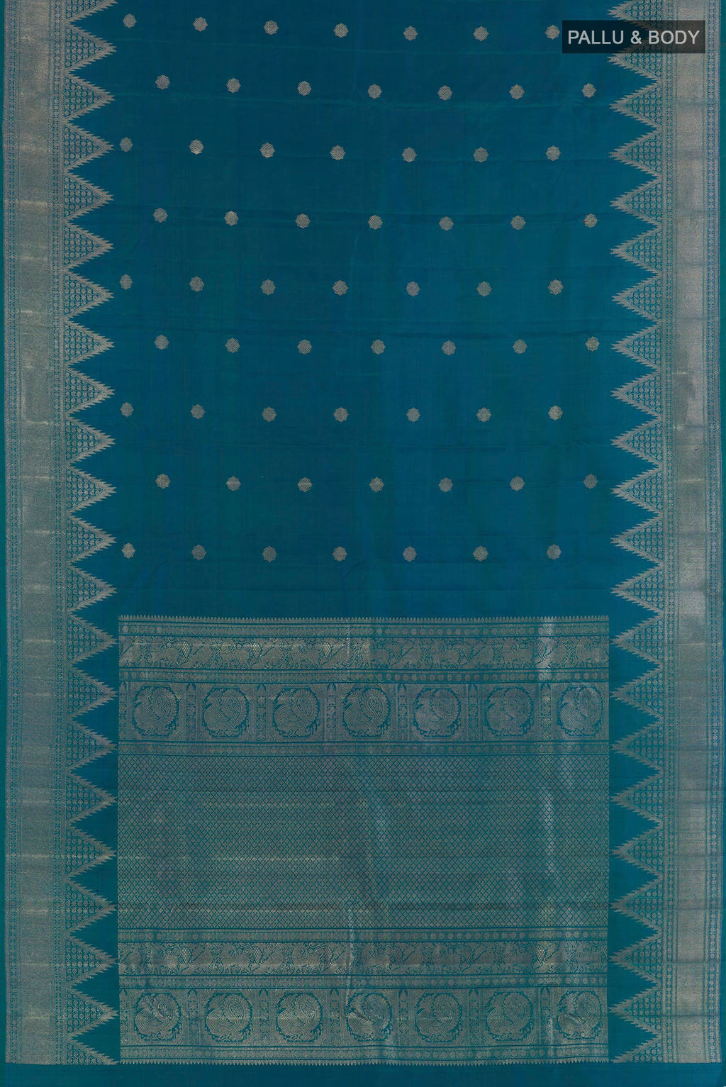 Flat view of Peacock Blue Kanchipuram Silk Saree with Zari Butta on the body and Temple Border. 