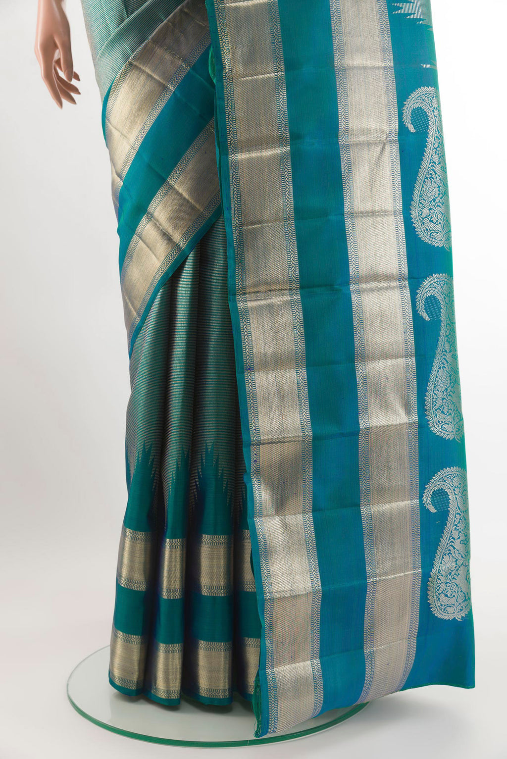 Pleats and pallu of Peacock Blue Kanchipuram Silk Saree with Zari Brocade on the body and Zari Border. 