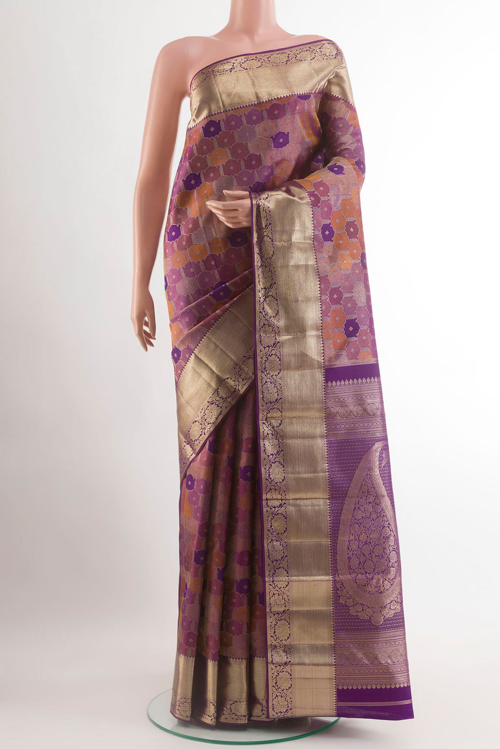 Purple Kanjivaram Silk Saree with Zari Brocade on the body and Zari Border.  displayed on a mannequin