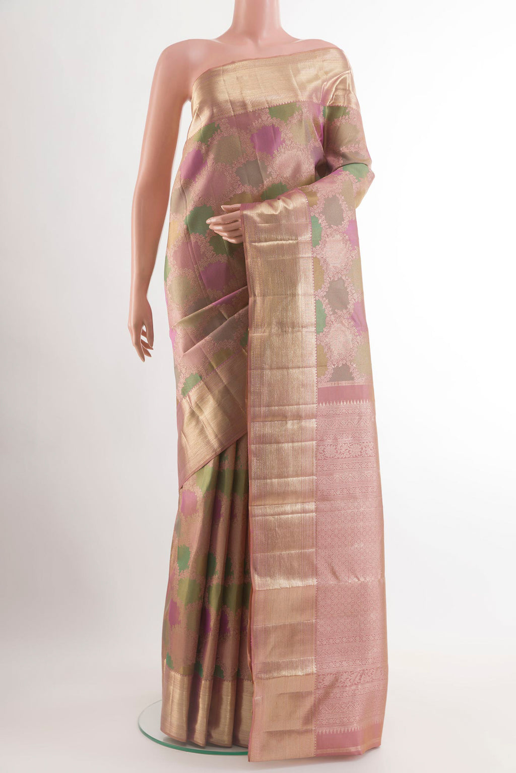 Multi Color Kanjivaram Silk Saree with Zari Brocade on the body and Zari Border.  displayed on a mannequin