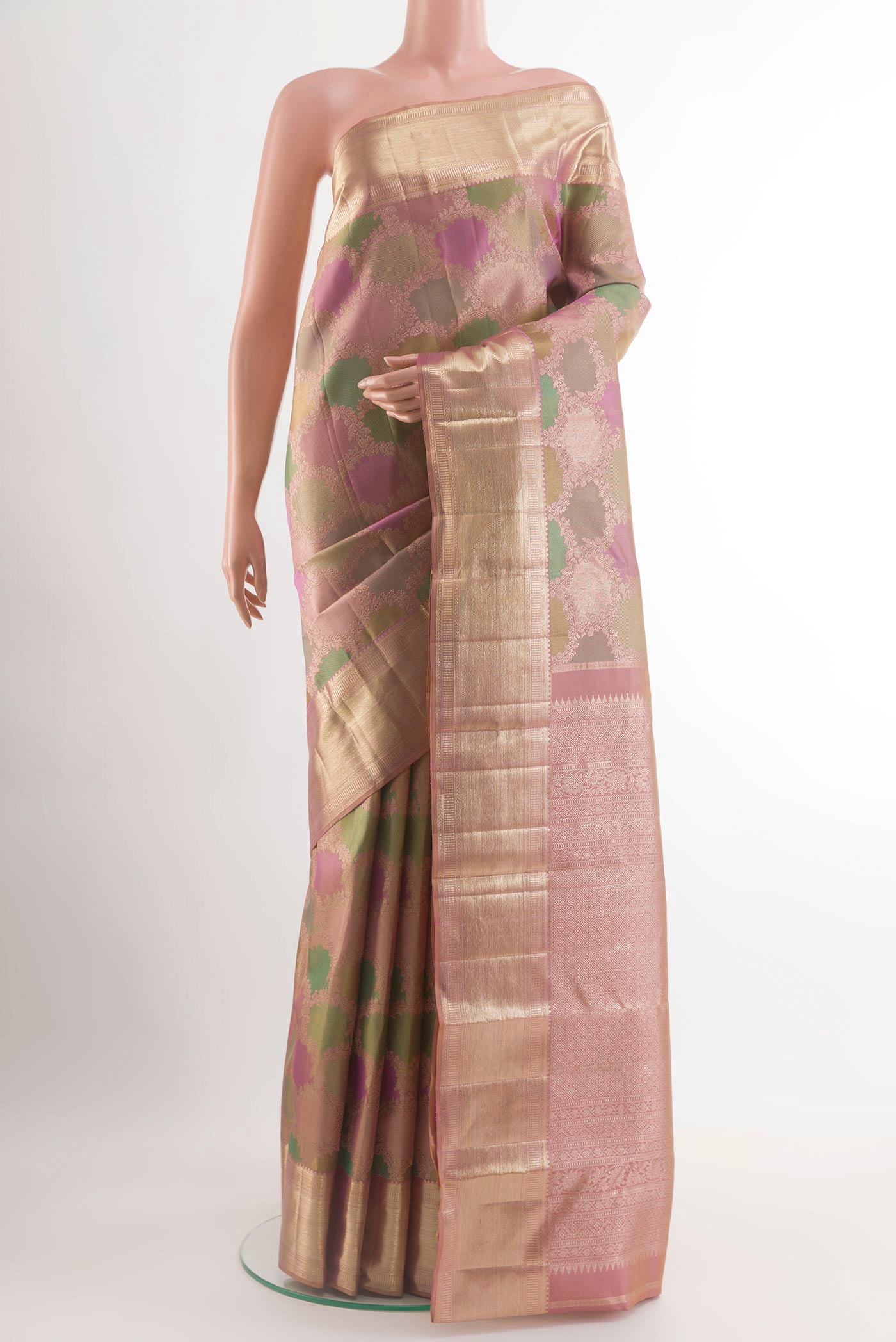 Multi Color Kanjivaram Silk Saree with Zari Brocade on the body and Zari Border.  displayed on a mannequin