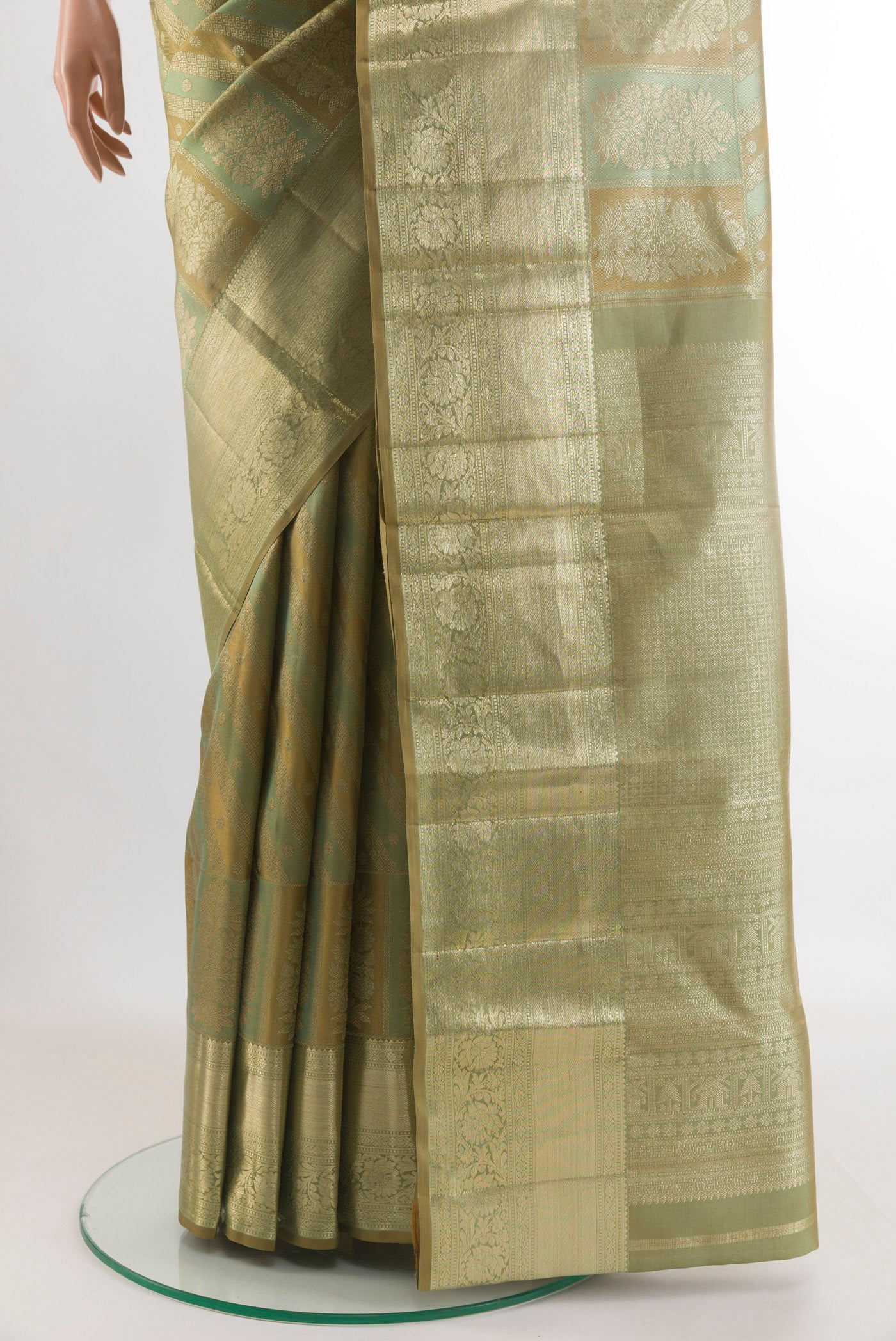 Pleats and pallu of Green Kanjivaram Silk Saree with Zari Brocade on the body and Zari Border. 