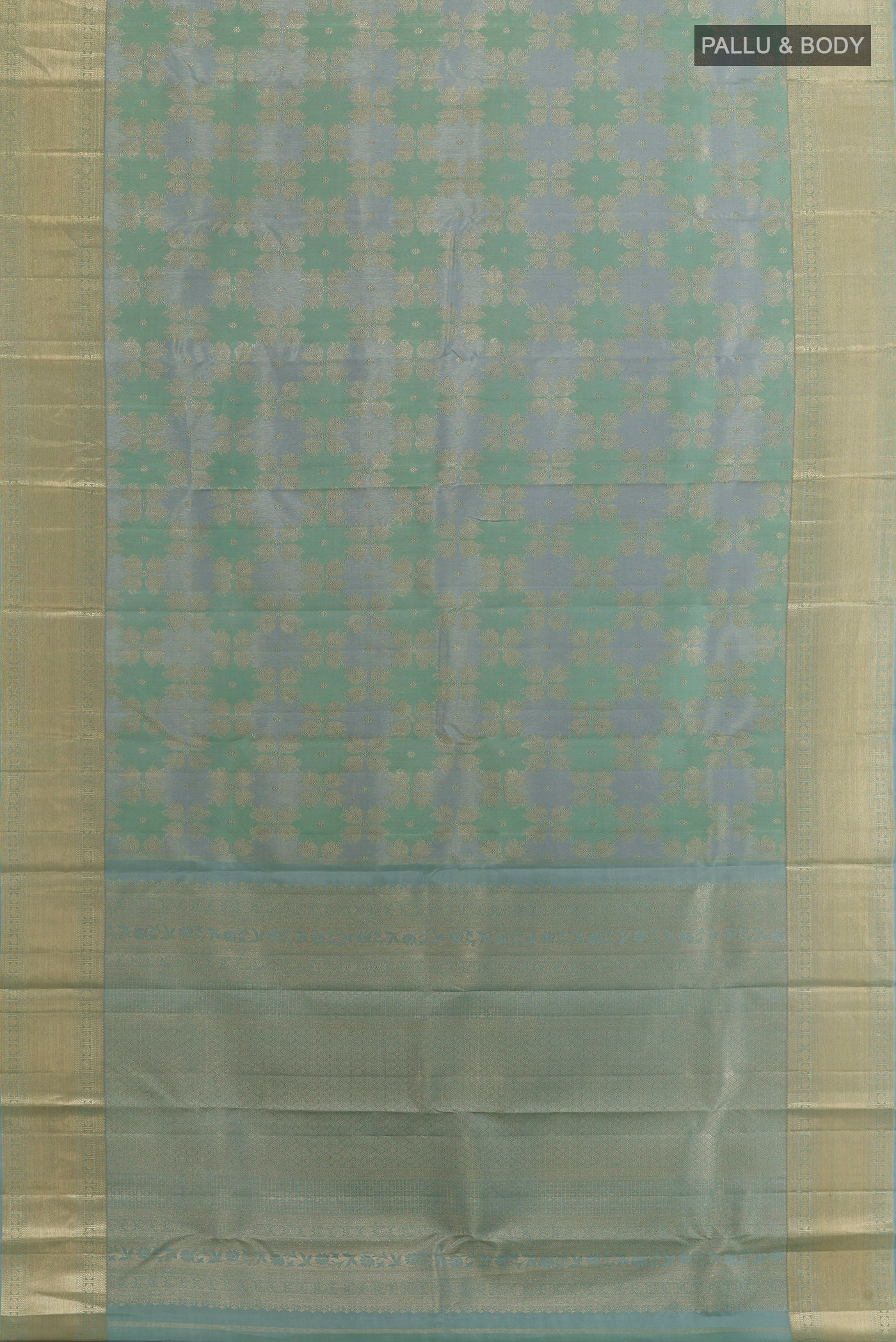 Flat view of Grey Kanjivaram Tissue Silk Saree with Zari Brocade on the body and Zari Border. 