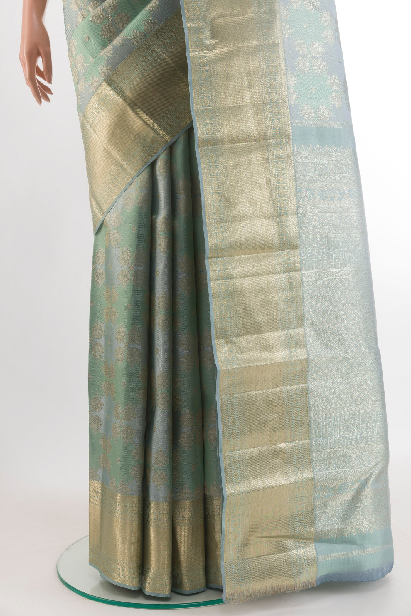 Pleats and pallu of Grey Kanjivaram Tissue Silk Saree with Zari Brocade on the body and Zari Border. 