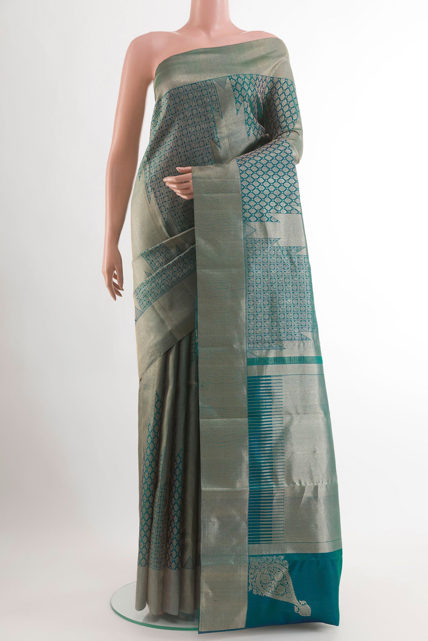 Peacock Blue Dual Tone Kanchipuram Silk Saree with Zari Brocade on the body and Zari Border.  displayed on a mannequin