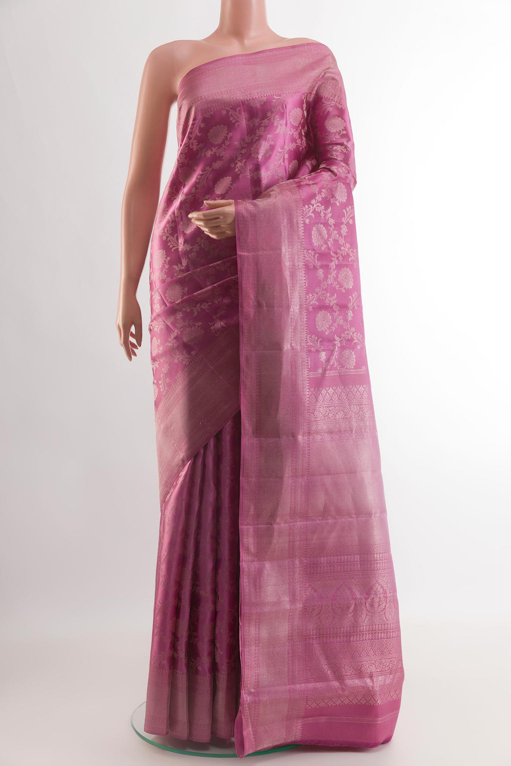 Purple Kanjivaram Silk Saree with Zari Brocade on the body and Zari Border.  displayed on a mannequin