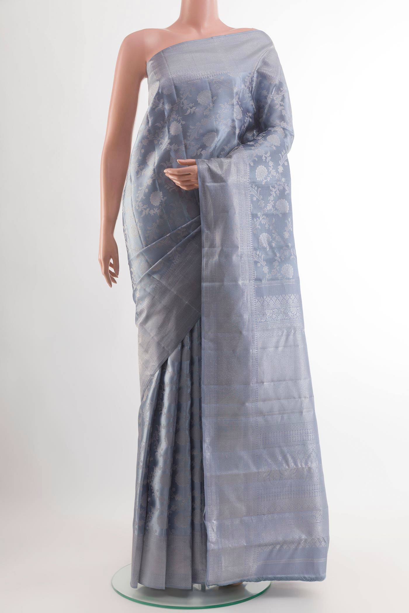 Blue Grey Kanjivaram Silk Saree with Zari Brocade on the body and Zari Border.  displayed on a mannequin