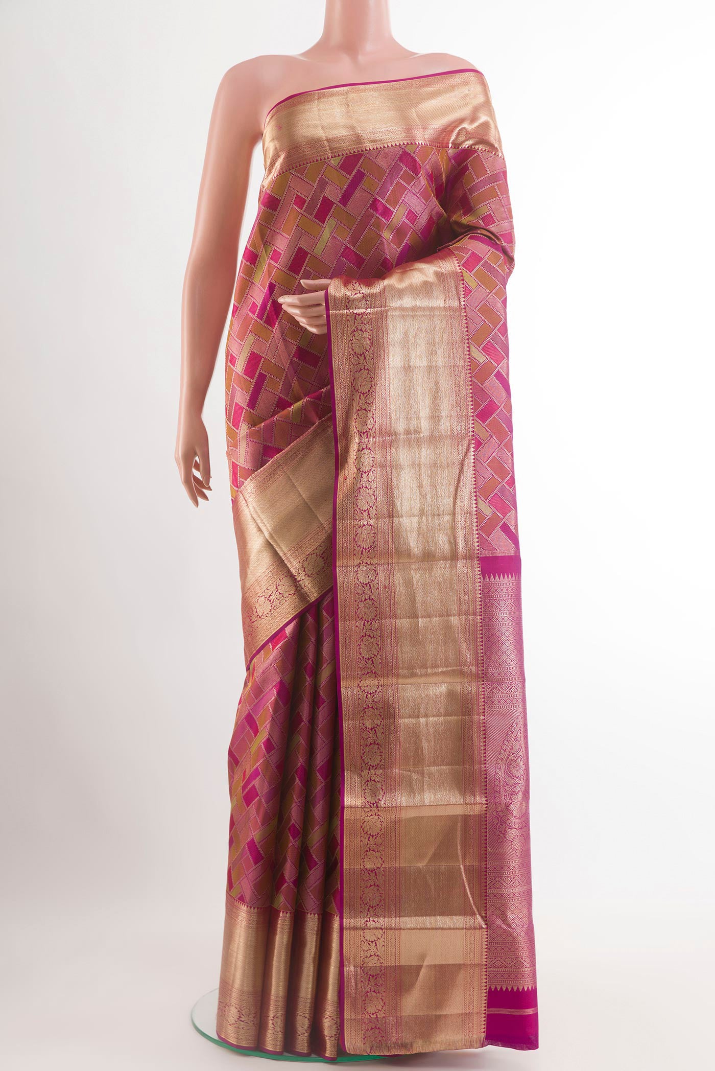 Magenta Kanjivaram Silk Saree with Zari Brocade on the body and Zari Border.  displayed on a mannequin
