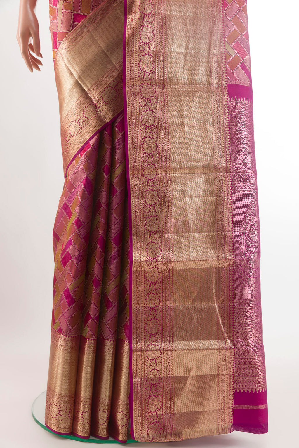 Pleats and pallu of Magenta Kanjivaram Silk Saree with Zari Brocade on the body and Zari Border. 
