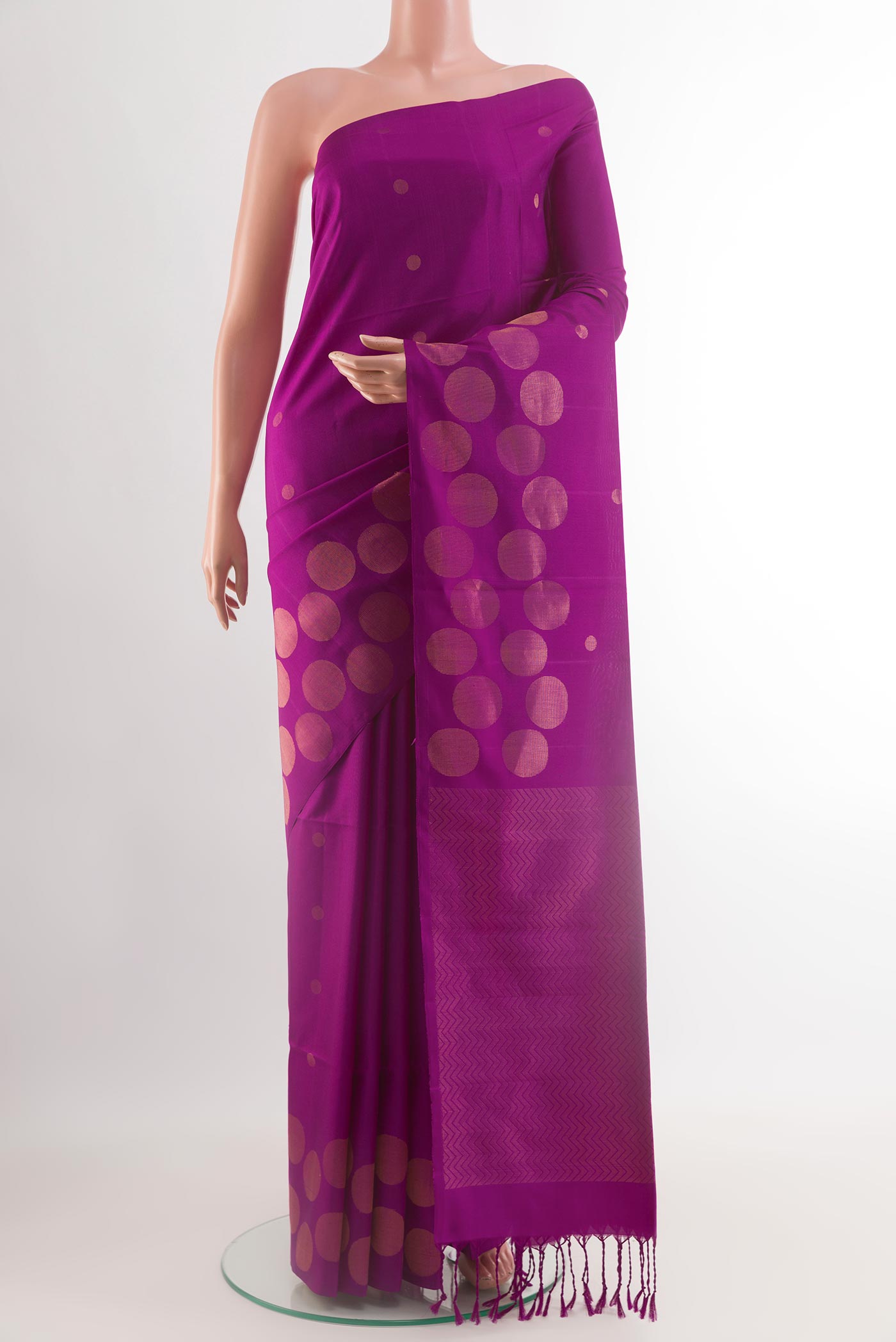 Purple Soft Silk Saree with Zari Butta on the body and Zari Border.  displayed on a mannequin