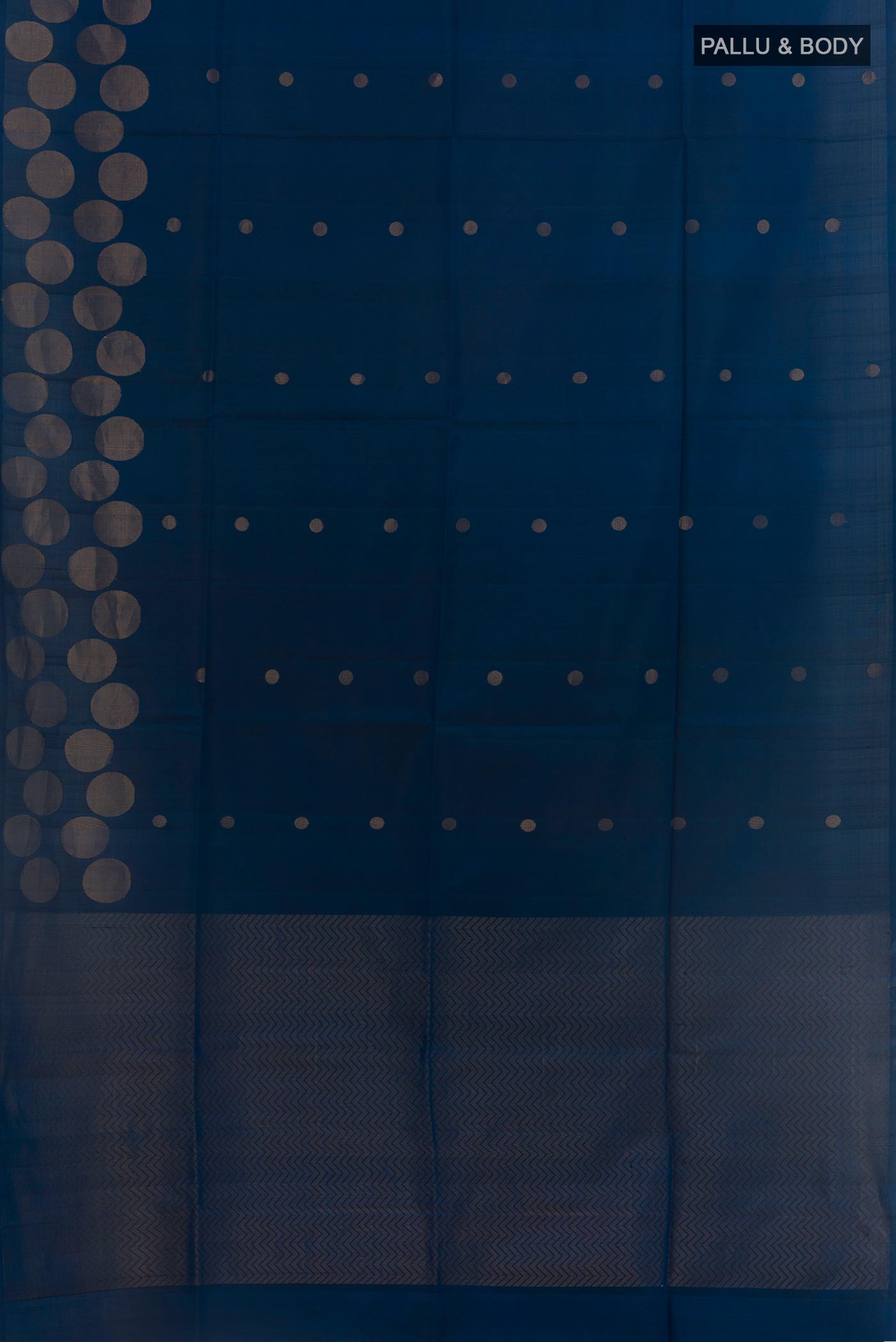 Flat view of Blue Soft Silk Saree with Zari Butta on the body and Zari Border. 