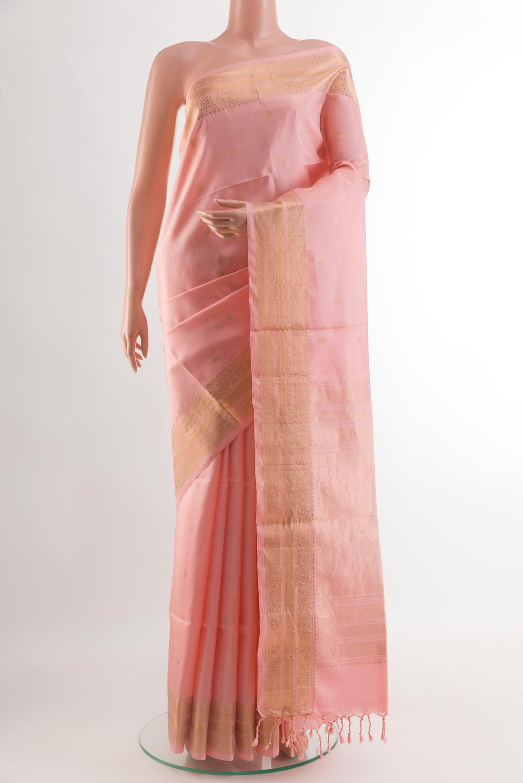 Pink Soft Silk Saree with Zari Butta on the body and Zari Border.  displayed on a mannequin
