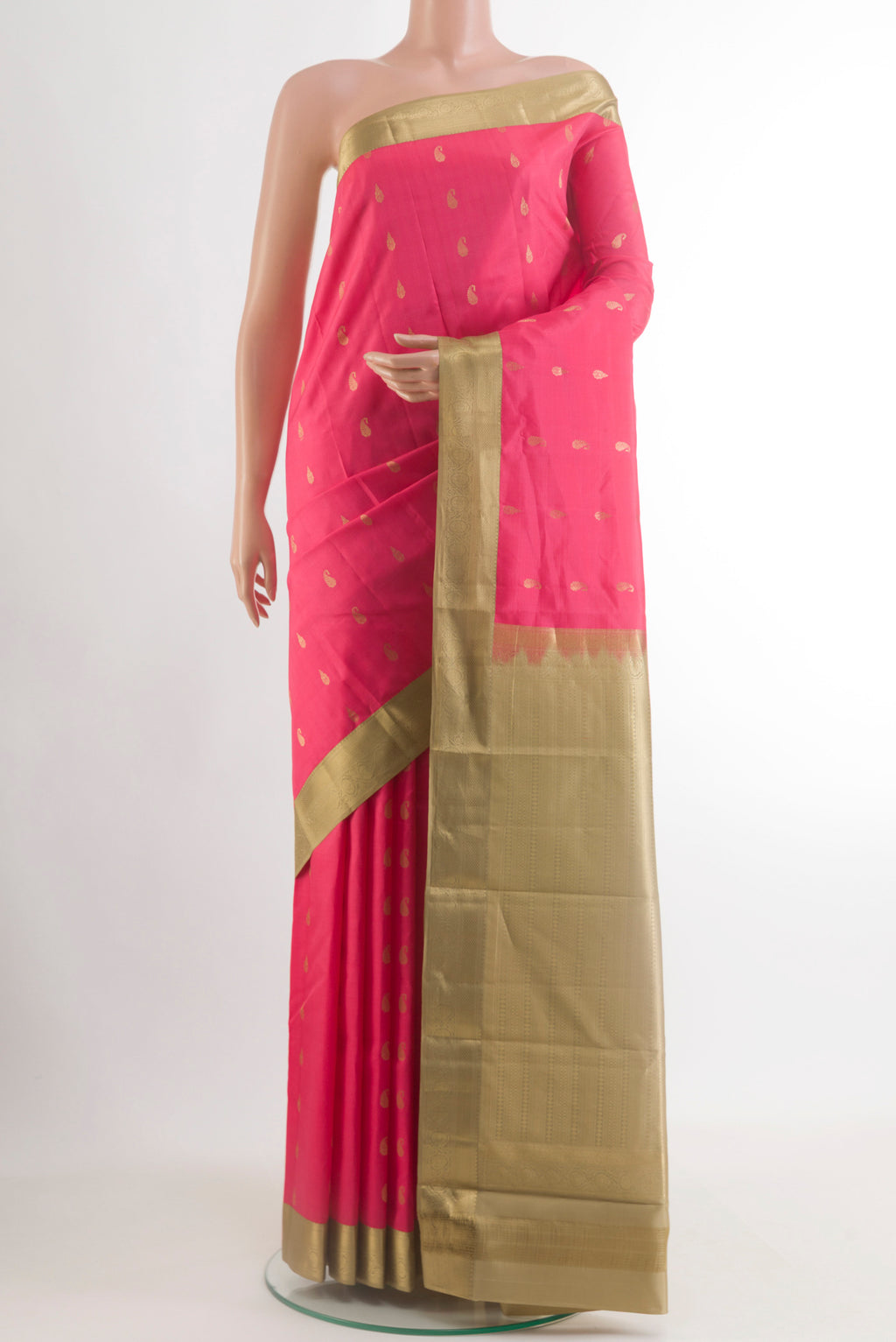 Pink Kanjivaram Silk Saree with Zari Butta on the body and Zari Border.  displayed on a mannequin