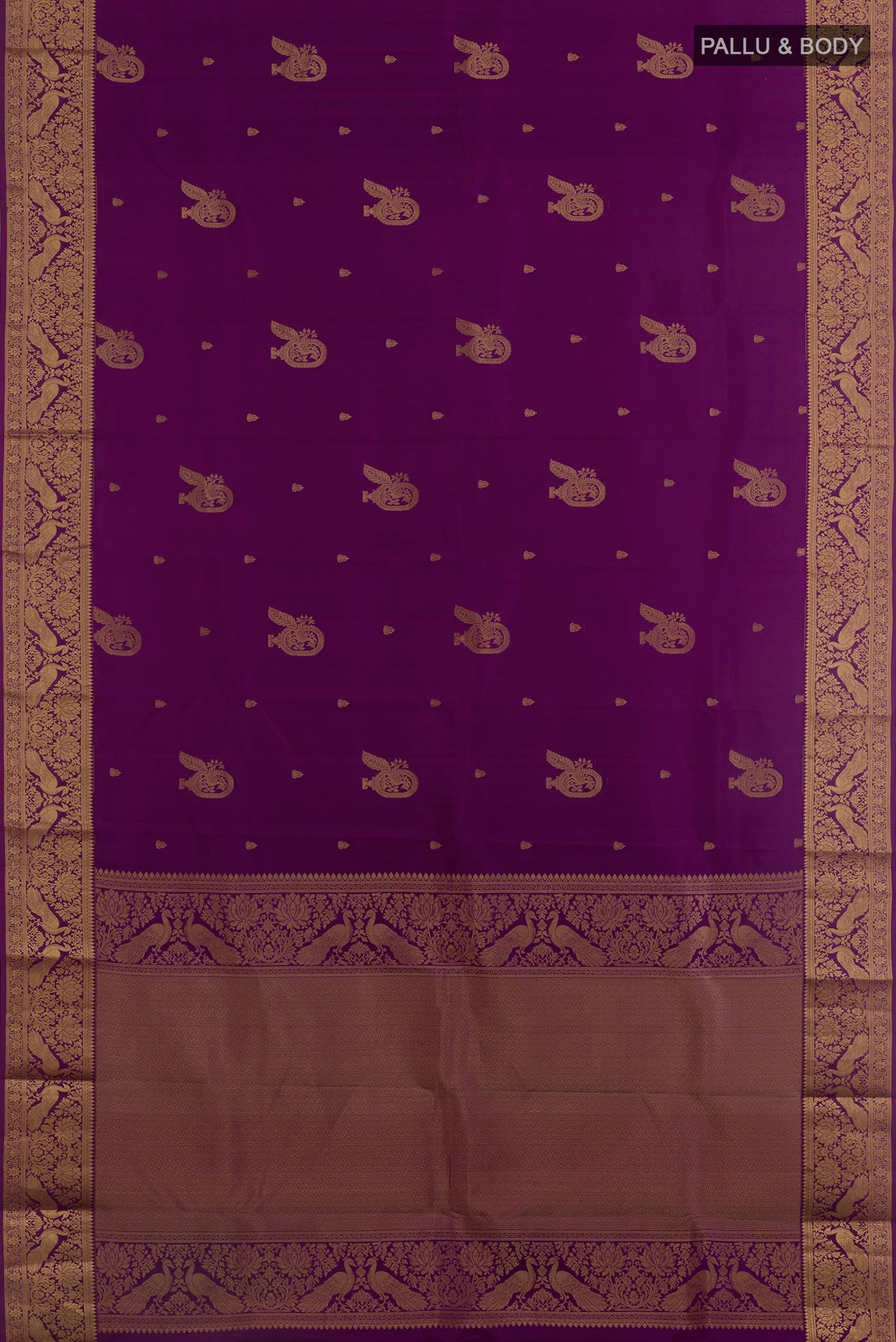 Flat view of Purple Kanjivaram Silk Saree with Zari Butta on the body and Zari Border. 