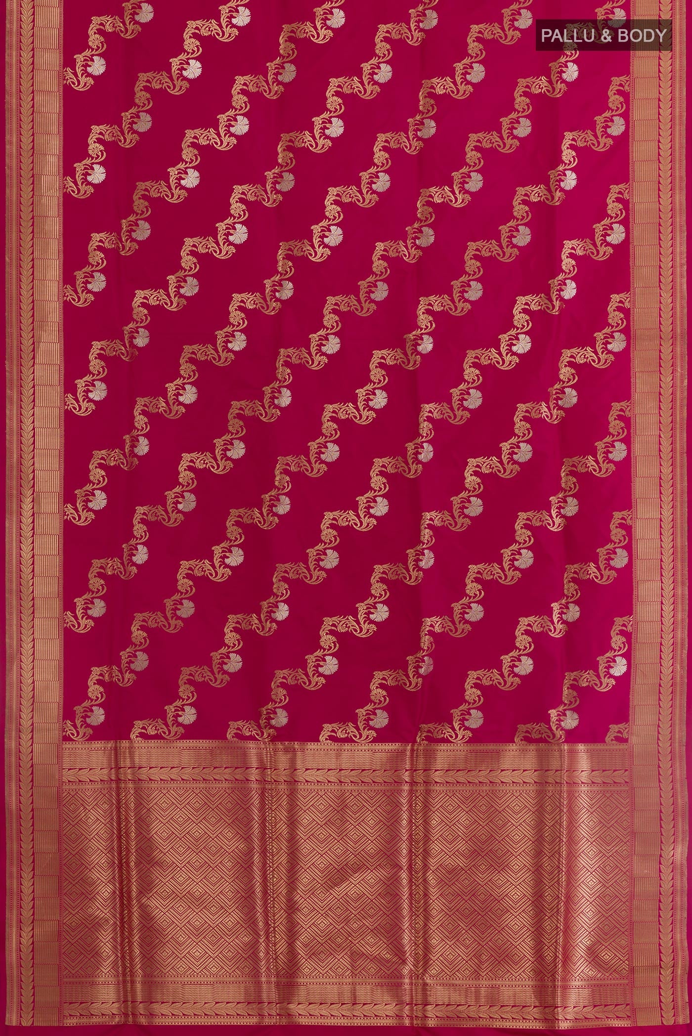 Flat view of Magenta Banarasi Silk Saree with Zari Butta on the body and Zari Border. 