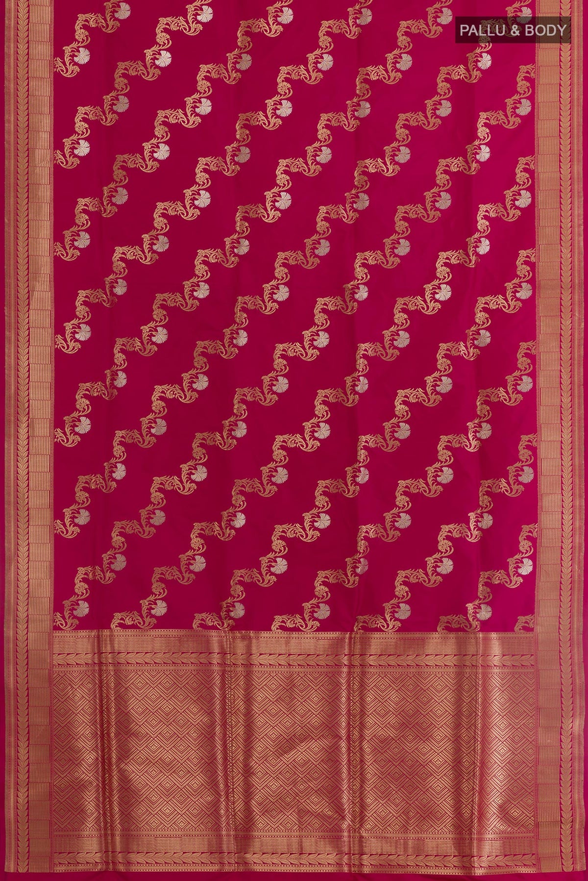 Flat view of Magenta Banarasi Silk Saree with Zari Butta on the body and Zari Border. 