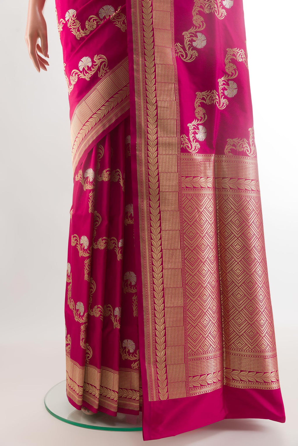 Pleats and pallu of Magenta Banarasi Silk Saree with Zari Butta on the body and Zari Border. 