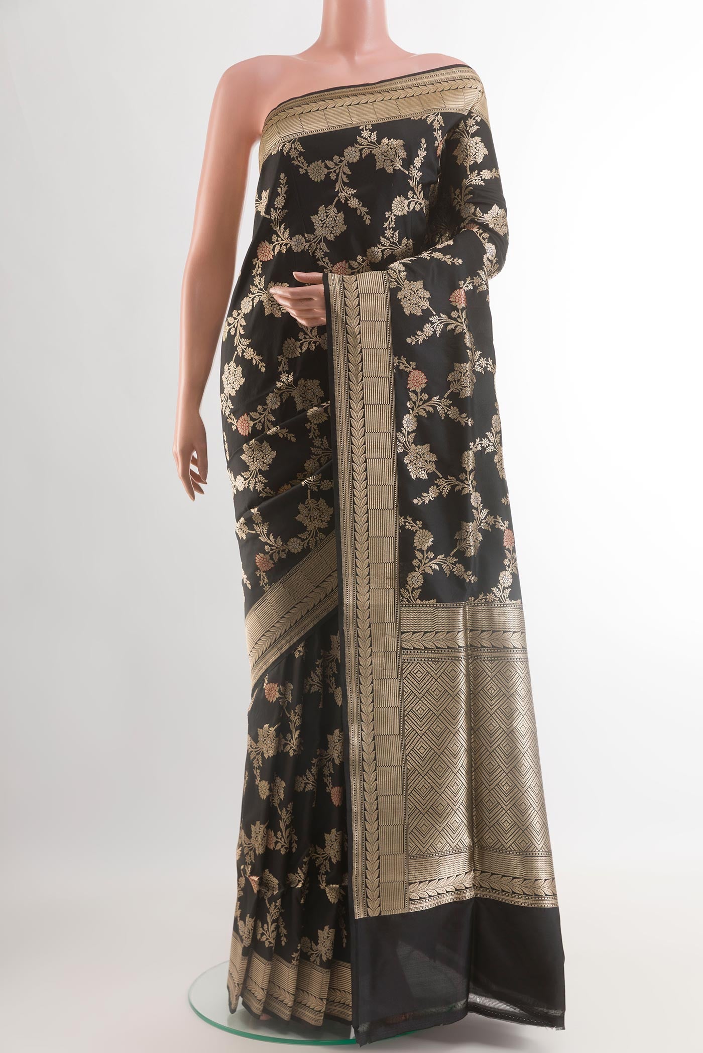 Black Banarasi Silk Saree with Zari Butta on the body and Zari Border.  displayed on a mannequin
