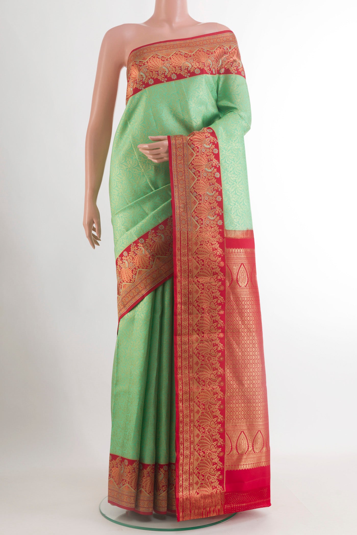 Sea Green Kanjivaram Silk Saree with Zari Brocade on the body and Zari Border.  displayed on a mannequin