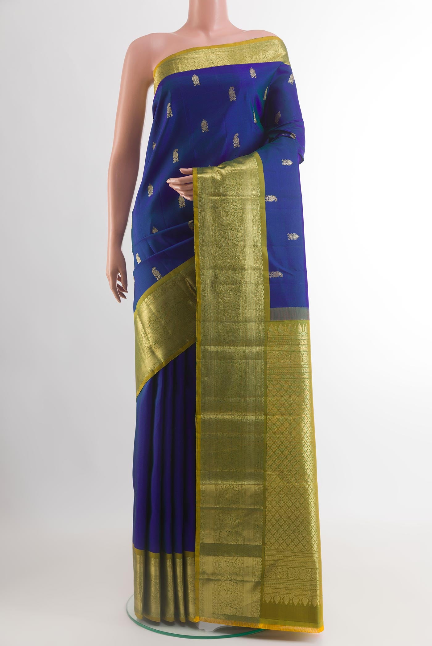Blue Kanchipuram Silk Saree with Zari Butta on the body and Zari Border.  displayed on a mannequin