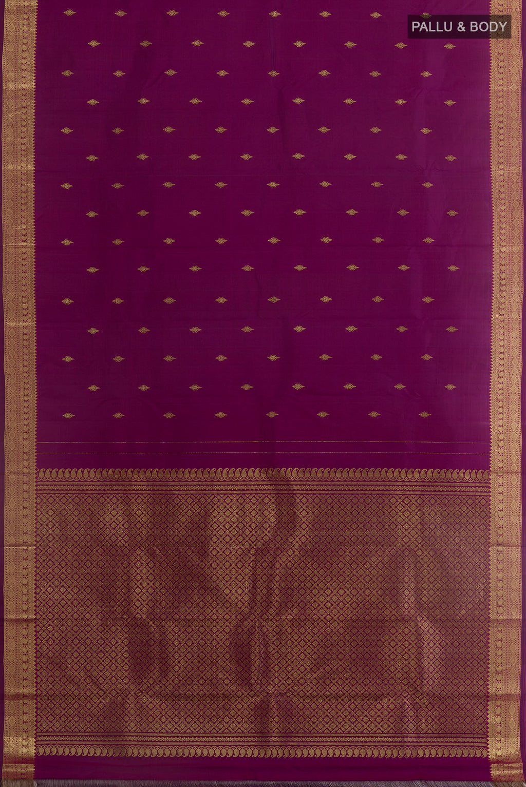 Flat view of Purple Kanchipuram Silk Saree with Zari Butta on the body and Zari Border. 