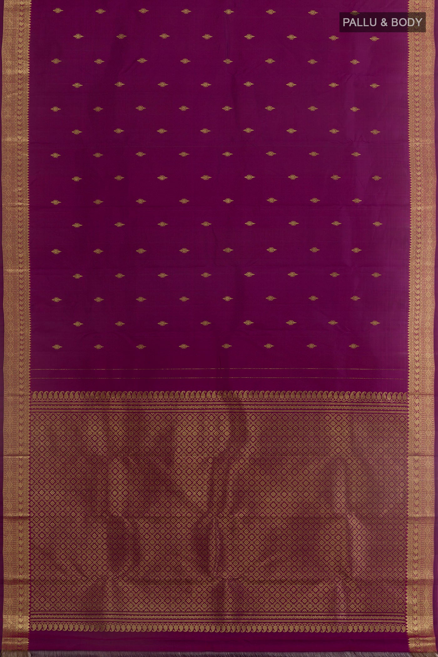 Flat view of Purple Kanchipuram Silk Saree with Zari Butta on the body and Zari Border. 