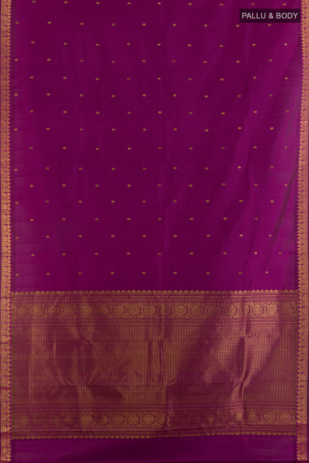 Flat view of Pure Silk Magenta Kanchipuram Saree with Zari Butta on the body and Zari Border. 