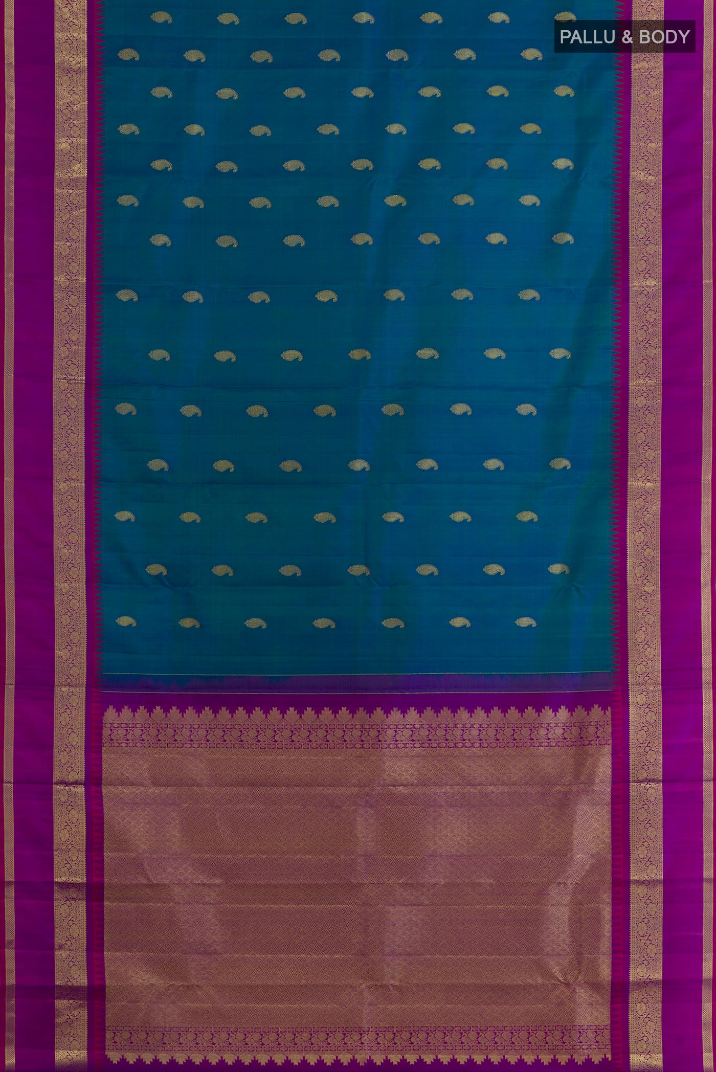 Flat view of Peacock Blue Kanchipuram Silk Saree with Zari Butta on the body and Zari Border. 