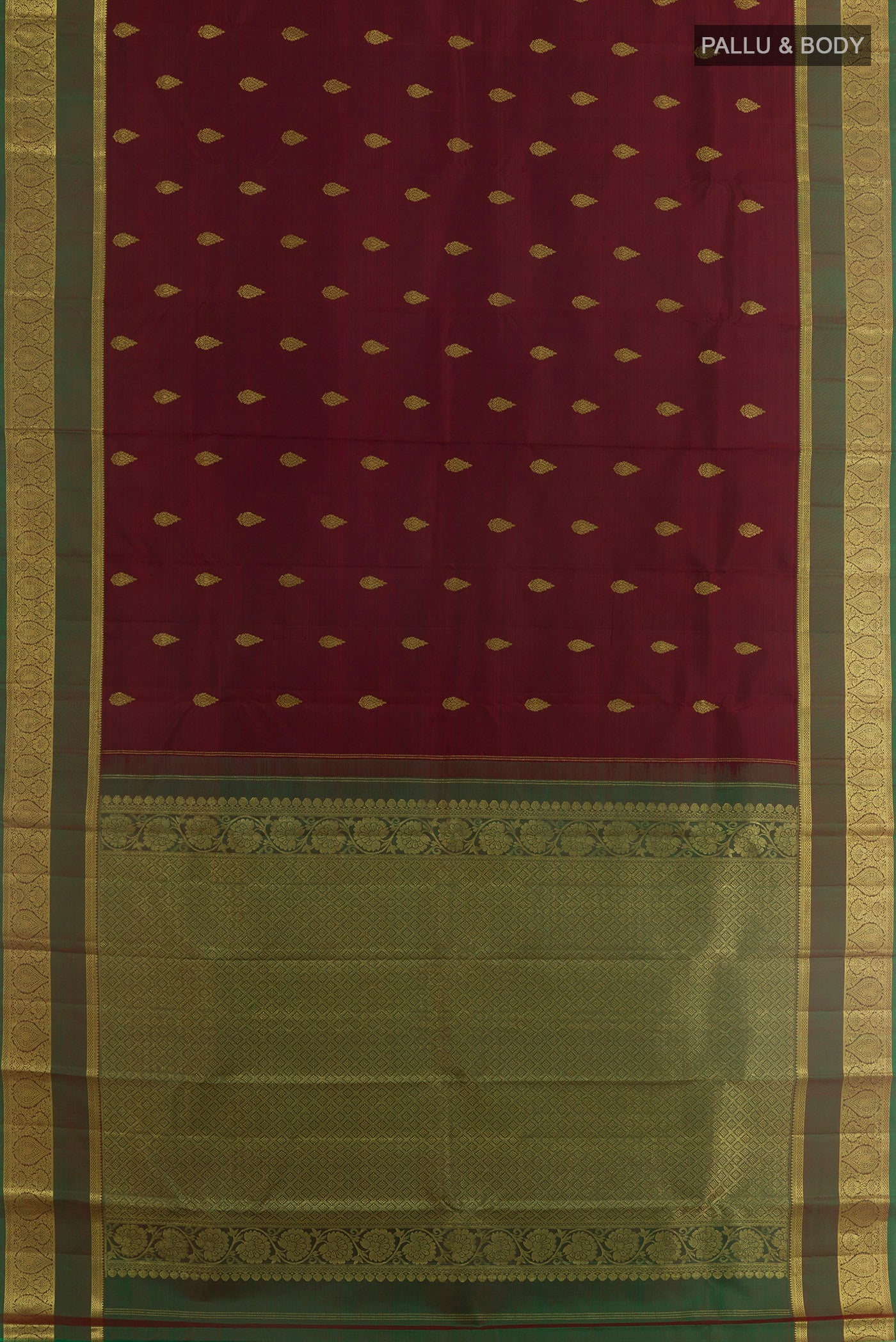 Flat view of Maroon Kanchipuram Silk Saree with Zari Butta on the body and Zari Border. 
