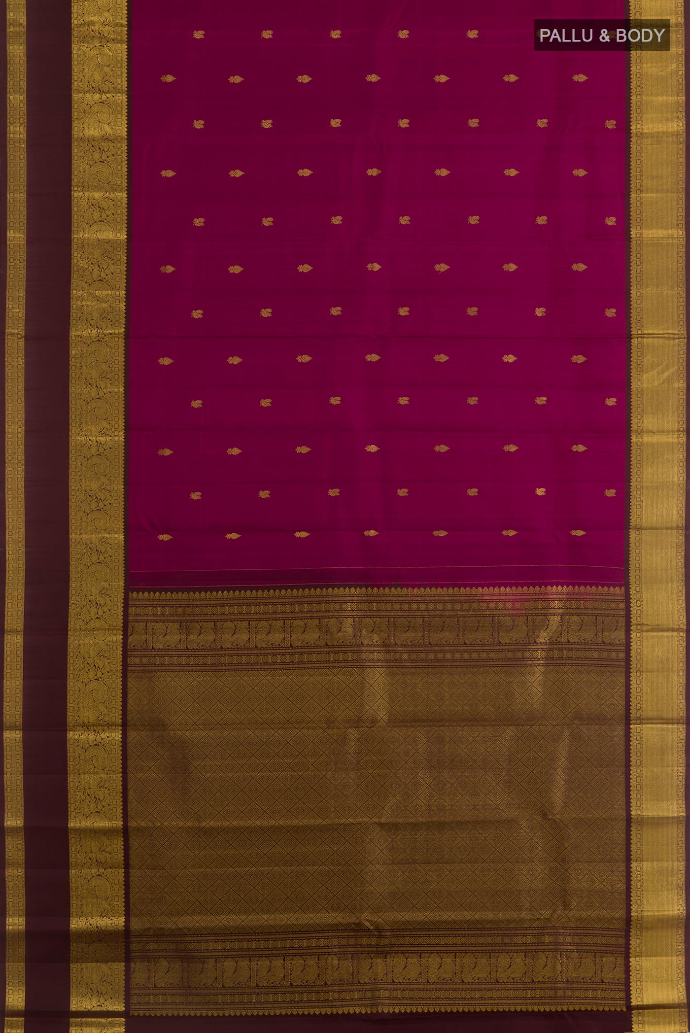 Flat view of Magenta Kanchipuram Silk Saree with Zari Butta on the body and Zari Border. 