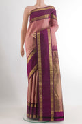 Pink Kanchipuram Silk Saree with Stripes on the body and Zari Border.  displayed on a mannequin
